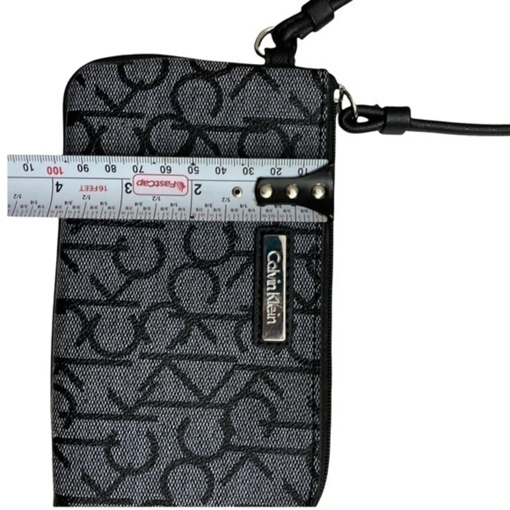 Calvin Klein gray black signature ck wristlet bag